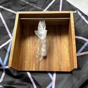 Threshold napkin holder